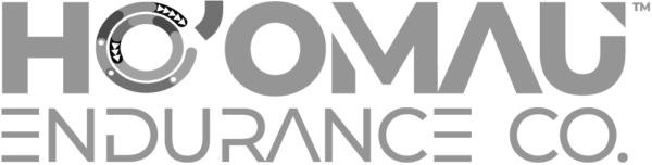 The non-standard horizontal version of the Ho'Omau Endurance Co. logo in grayscale with a TM trademark symbol in PNG format and 1000x253 size.