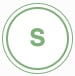 A green letter S, representing an endurance word game for athletes, is centered inside two green concentric circles on a white background, explaining the visual components of the Five Watt 5x5 endurance word game by Ho'Omau.