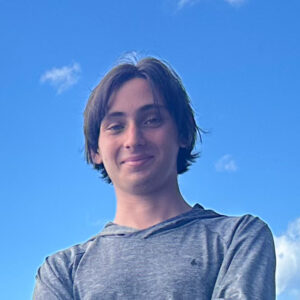 justin funk profile photo in front of blue sky